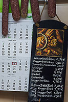 Innenansicht Dorfladen Groß Lengden: Preisschild Brötchen/Brot, Wurstwaren